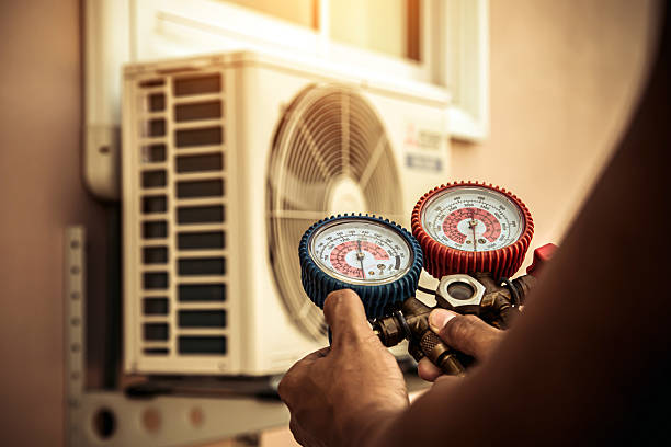 Professional Hvac technician working in Helm, CA